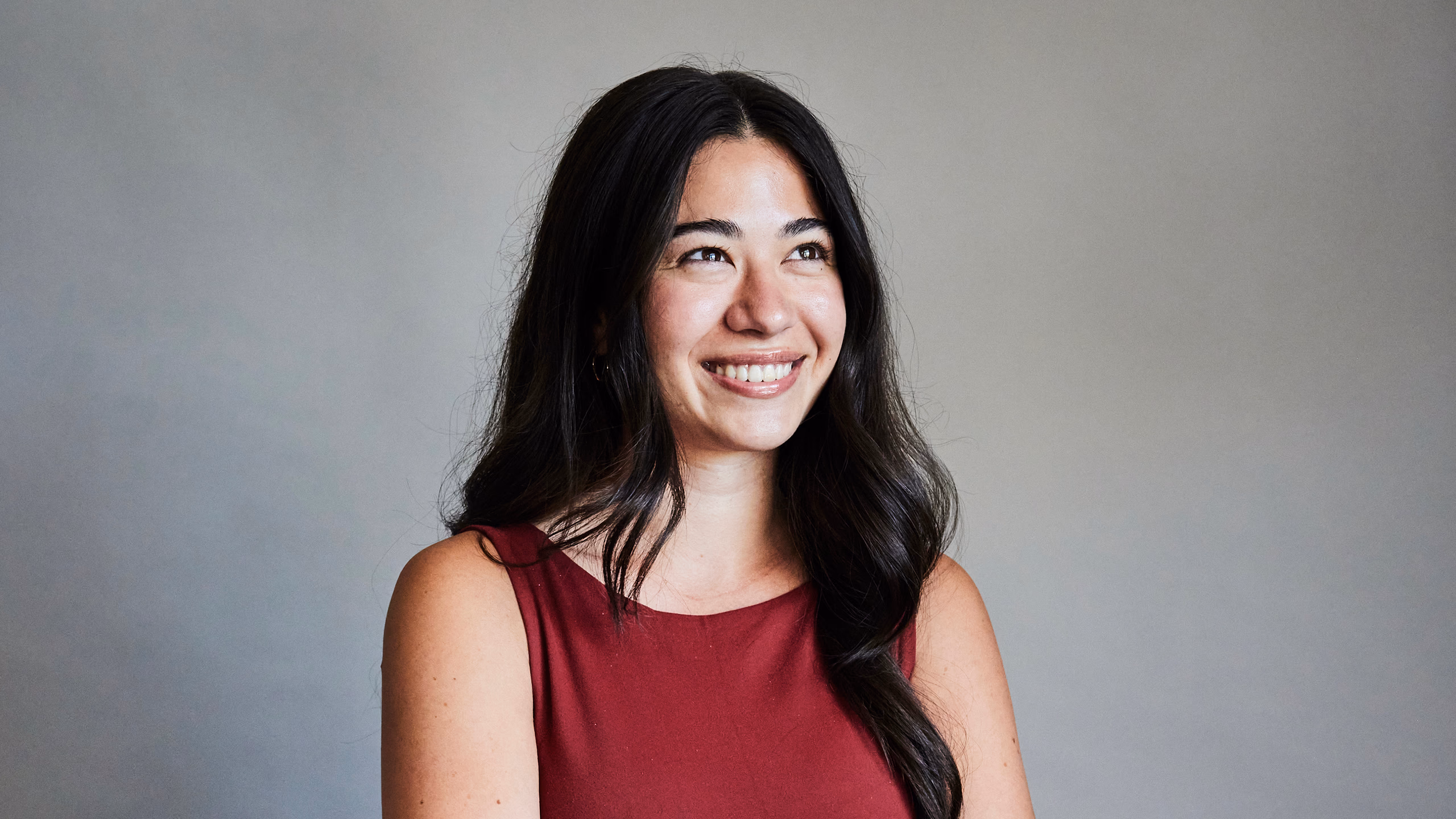 A CareerTrackers student smiling in the What’s Your Dream campaign portrait.